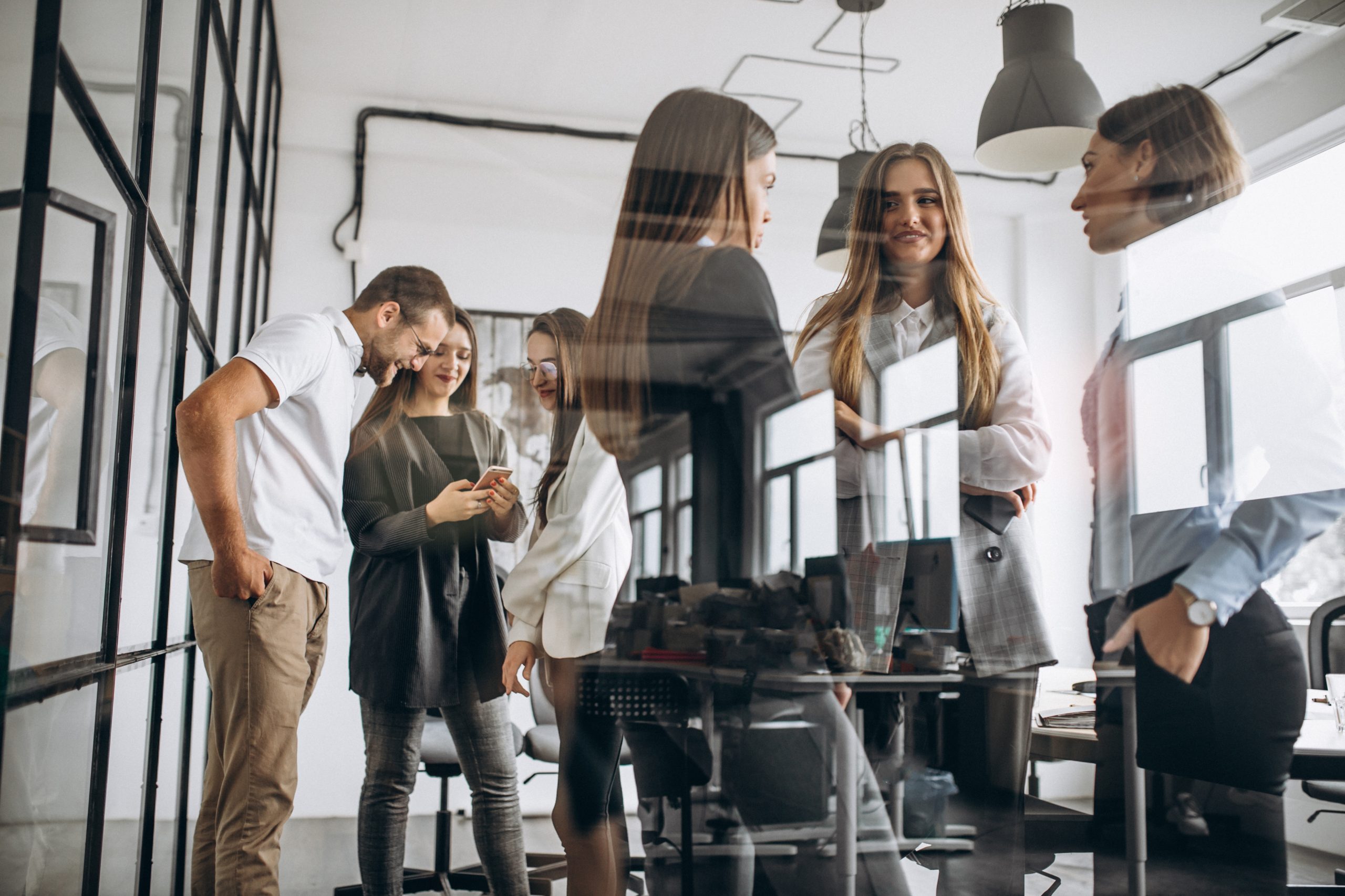 group of people working out business plan in an office